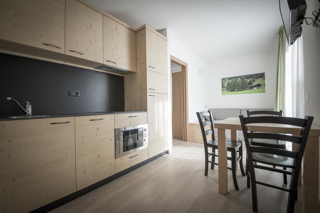 Aparthotel Dolomites Living&Relax Commezzadura Rom bilde